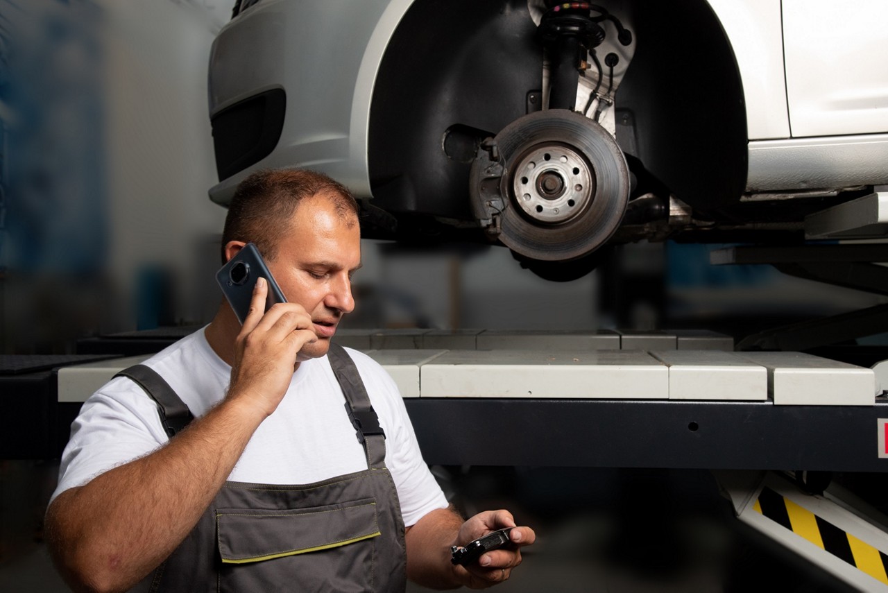 Garage Gurus On-Call service Garage Gurus mechanic attending a technical call at a garage